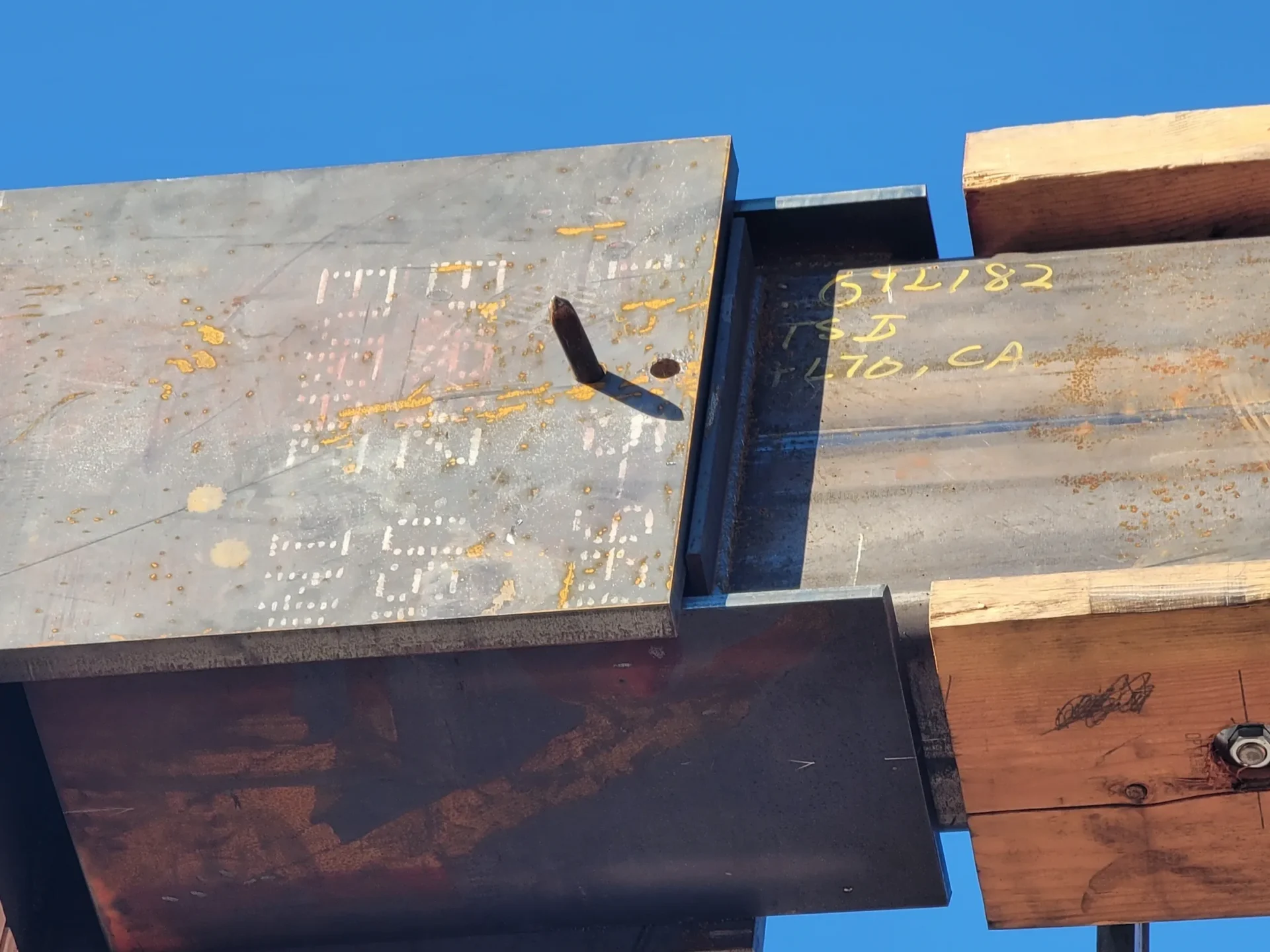 A metal structure with some writing on it